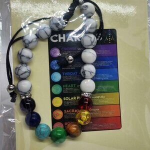 Brand New   The Seven Chakras with White/Black Beaded Bracelet